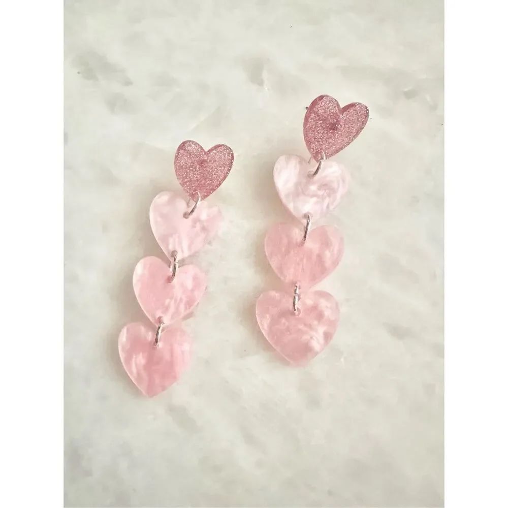 Light pink cascading heart earrings